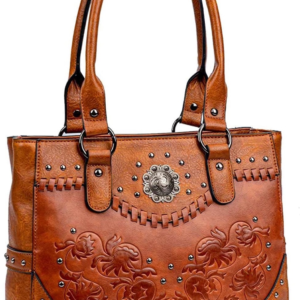 Brown leather bag used only a few days needed something larger